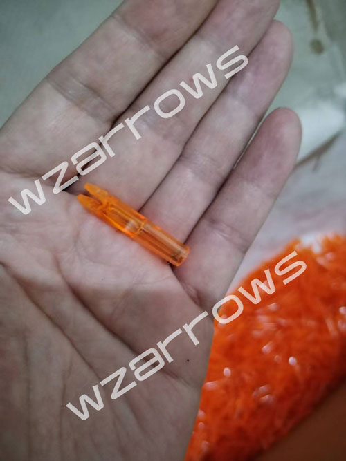 orange nock in hand